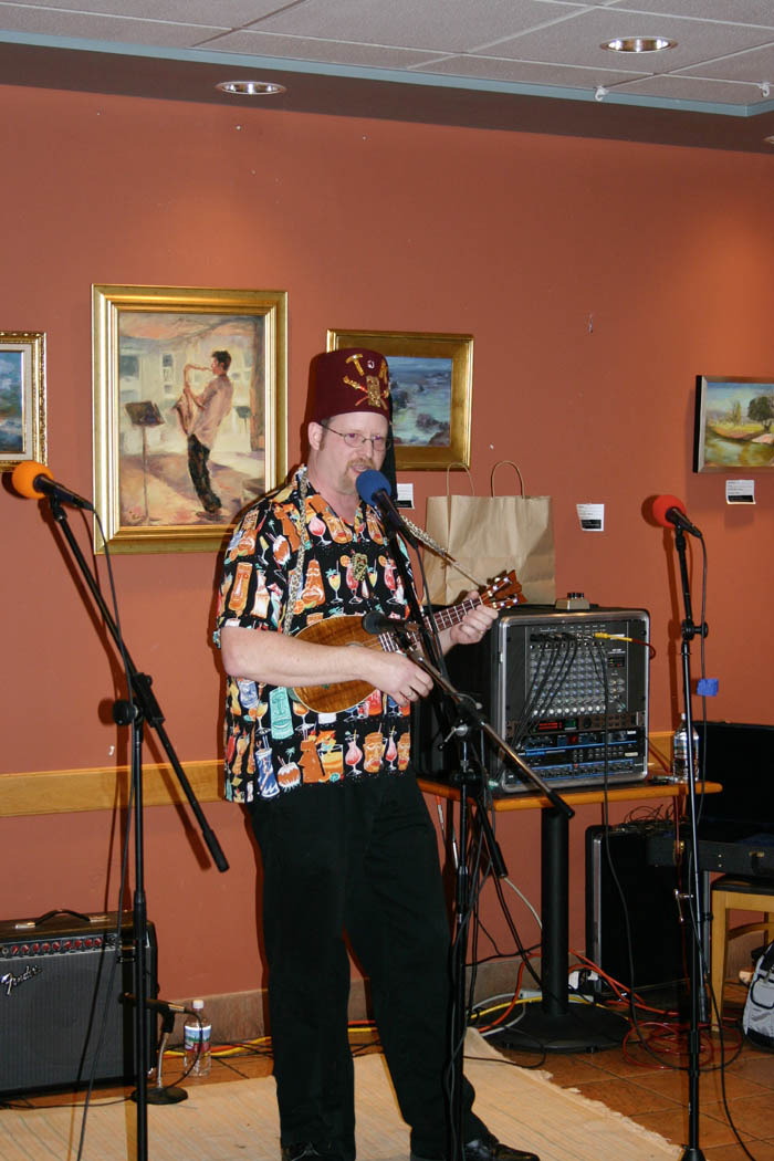 Tiki King playing Ukulele at Borders 1