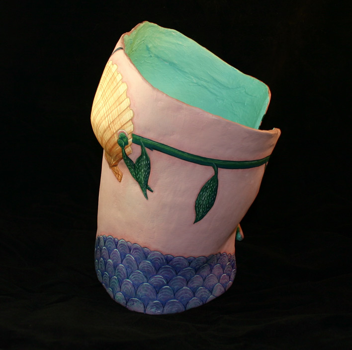 Painted Keep-A-Breast casting by Tiki King, side view