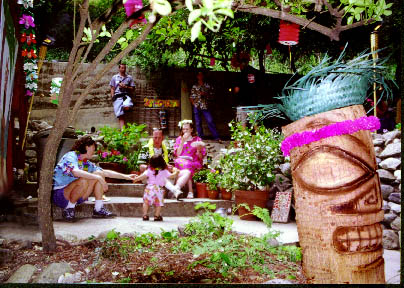 Tiki looks on at the luau