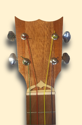 Haunted Mansion inspired Banjo Uke headstock by Tiki King, from: www.tikiking.com