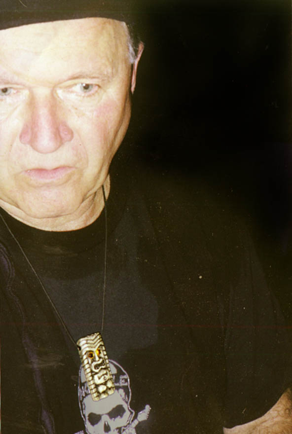 Dick dale wearing Tiki King necklace