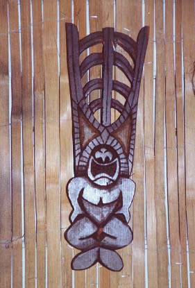 Tiki door pull, a carving by Tiki King