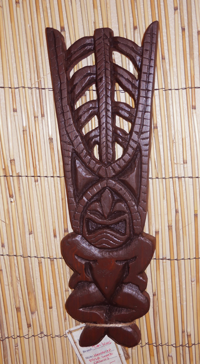 Pine Ku 2, a carving by Tiki King