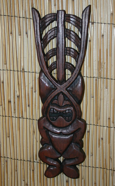 Stylized Ku wall carving by Tiki King