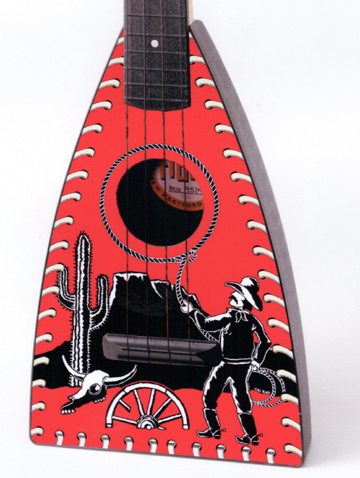 Close up of Cowboy Fluke Ukulele by Tiki King