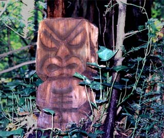 a small redwood Tiki, by Tiki King