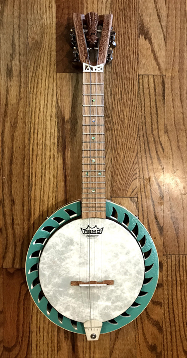 Tiki King small world inspired Banjo Uke #2, front