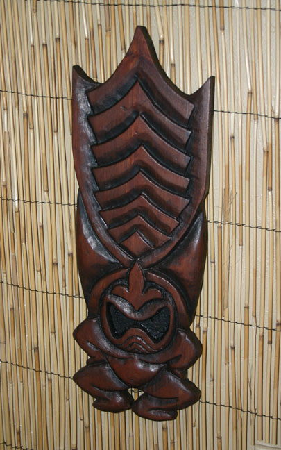 Stylized Ku wall carving by Tiki King