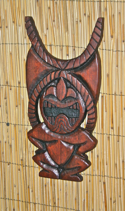 Stylized Ku wall carving by Tiki King