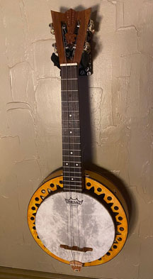 tahitian sun god tiki inspired Banjo Uke