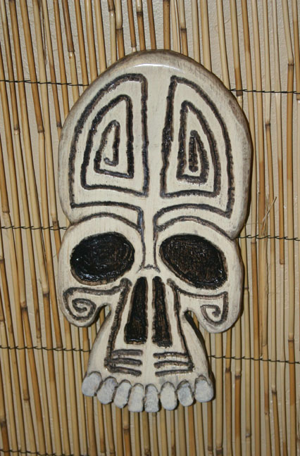 tattoo pine skull wall carving by Tiki King