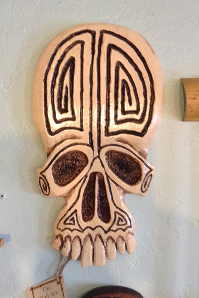 tattoo pine skull wall carving by Tiki King