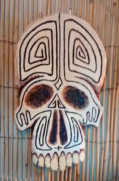 tattoo pine skull wall carving by Tiki King