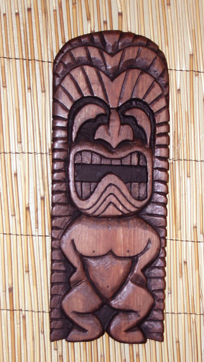 Stylized Ku wall carving, based on a key chain by Tiki King