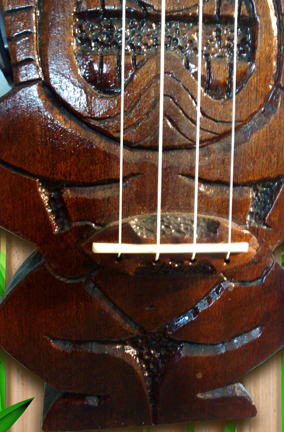 bridge detail on solid body tiki ukulele #3 by Tiki King