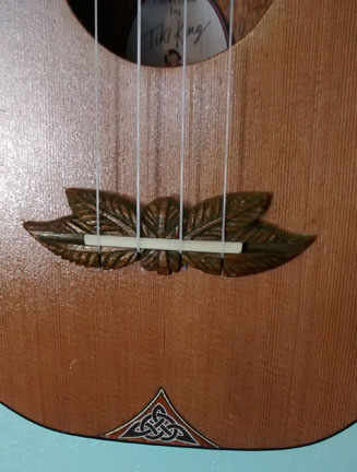 Tiki King Pineapple Cutaway Ukulele, #46 Bridge Detail