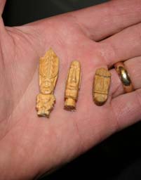 Tiny tiki carvings by Tiki King