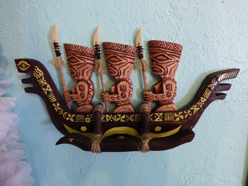 Marquesan War Canoe, a carving by Tiki King