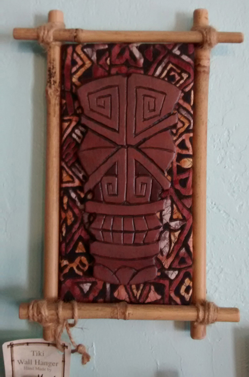 X-Eyes wall plaque, mixed media by Tiki King