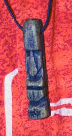stone head necklace by Tiki King